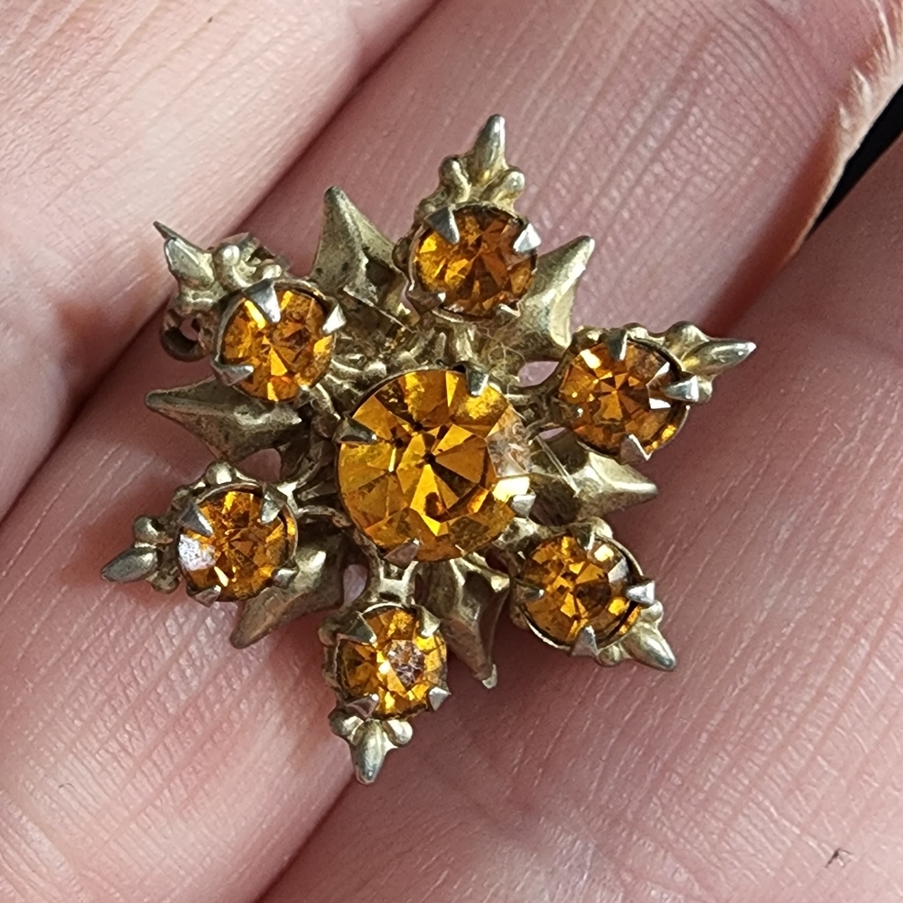 Gold Starburst Brooch with Orange Gems